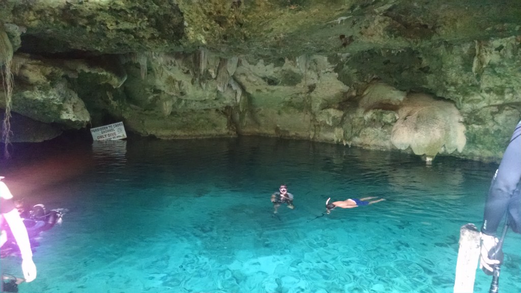 People swimming in a Cenote
